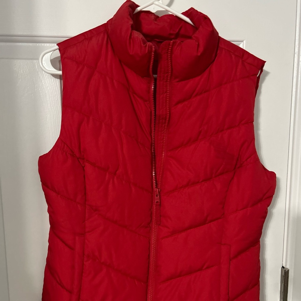 Women’s Red puffer vest.